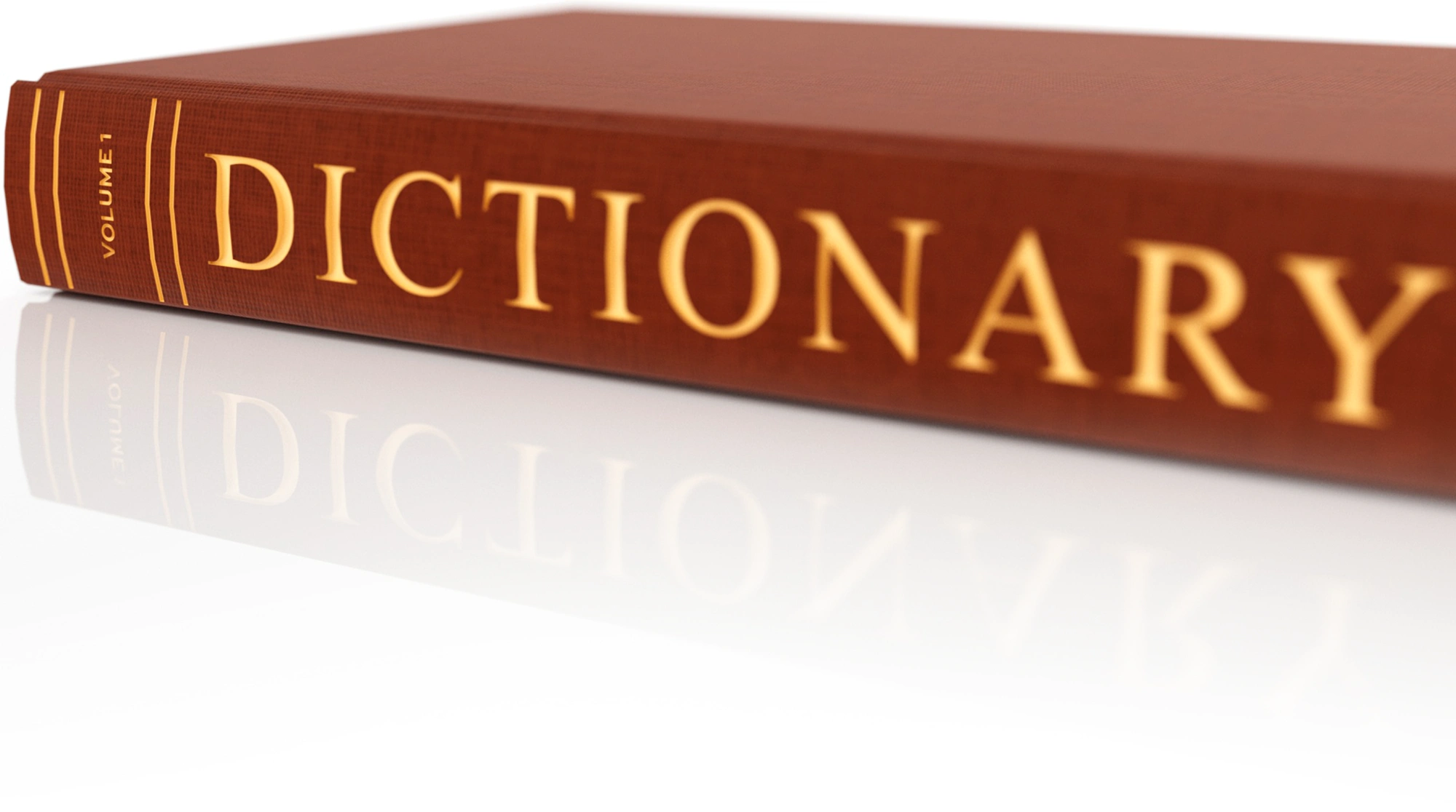 A close-up, low-angle shot of a brown book spine with the word "DICTIONARY" embossed in gold lettering.